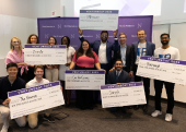 2023 VentureCat finalists pose with their awards. Charlotte Oxnam (in red), McCormick ‘23, won the grand prize for her plus-size social shopping app, Cue the Curves.